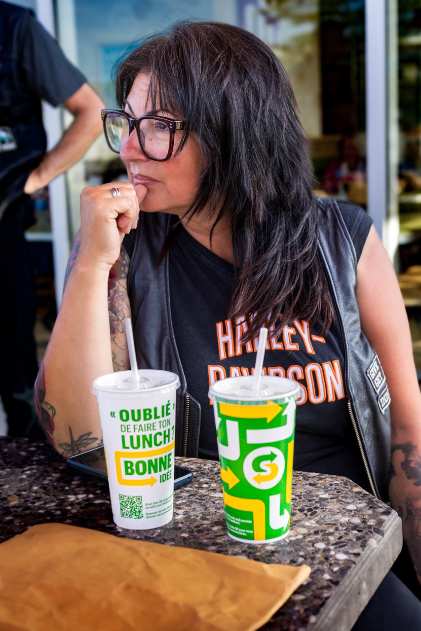 An attendee enjoying a drink at the event.