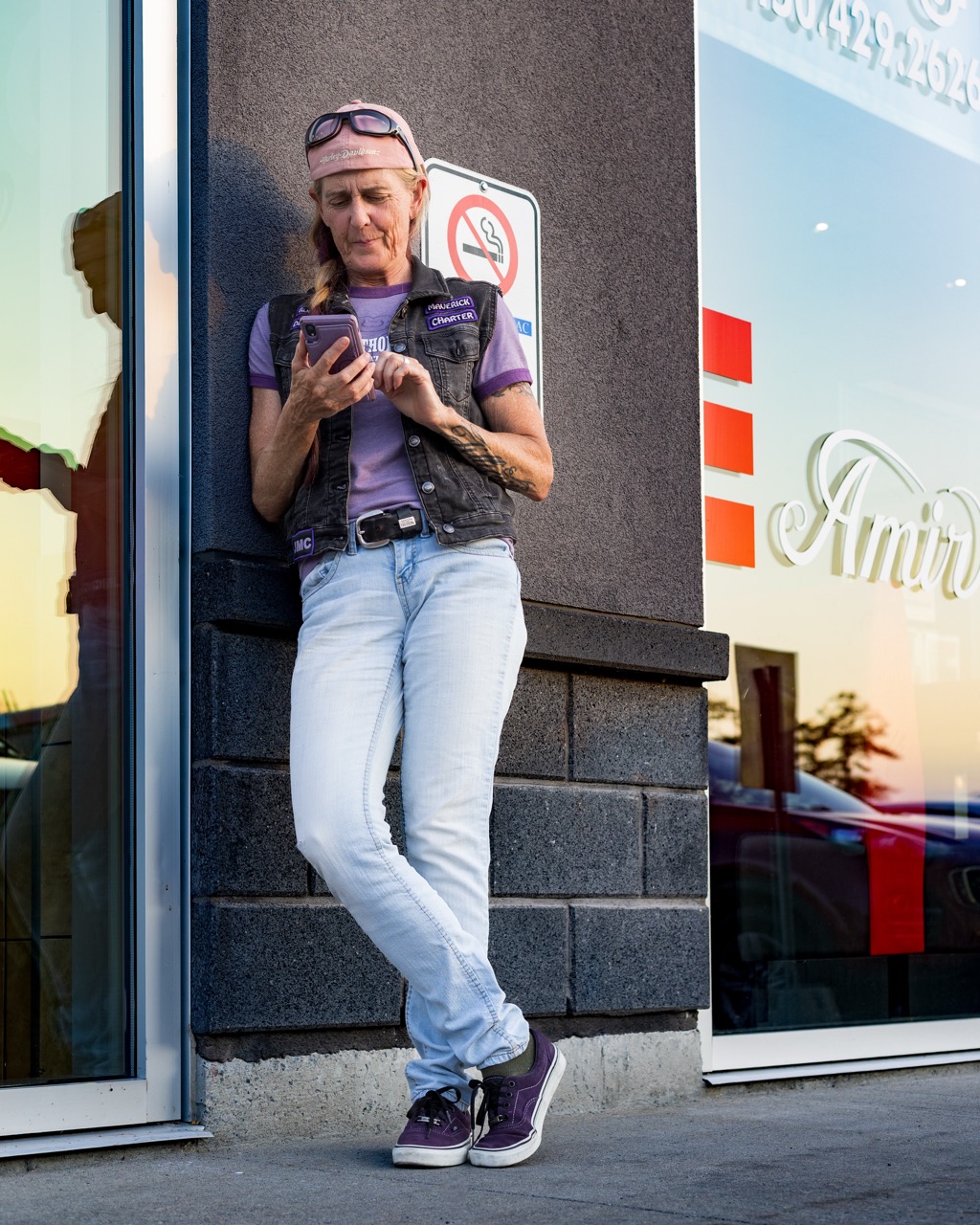 An attendee posing for a photo at sunset.